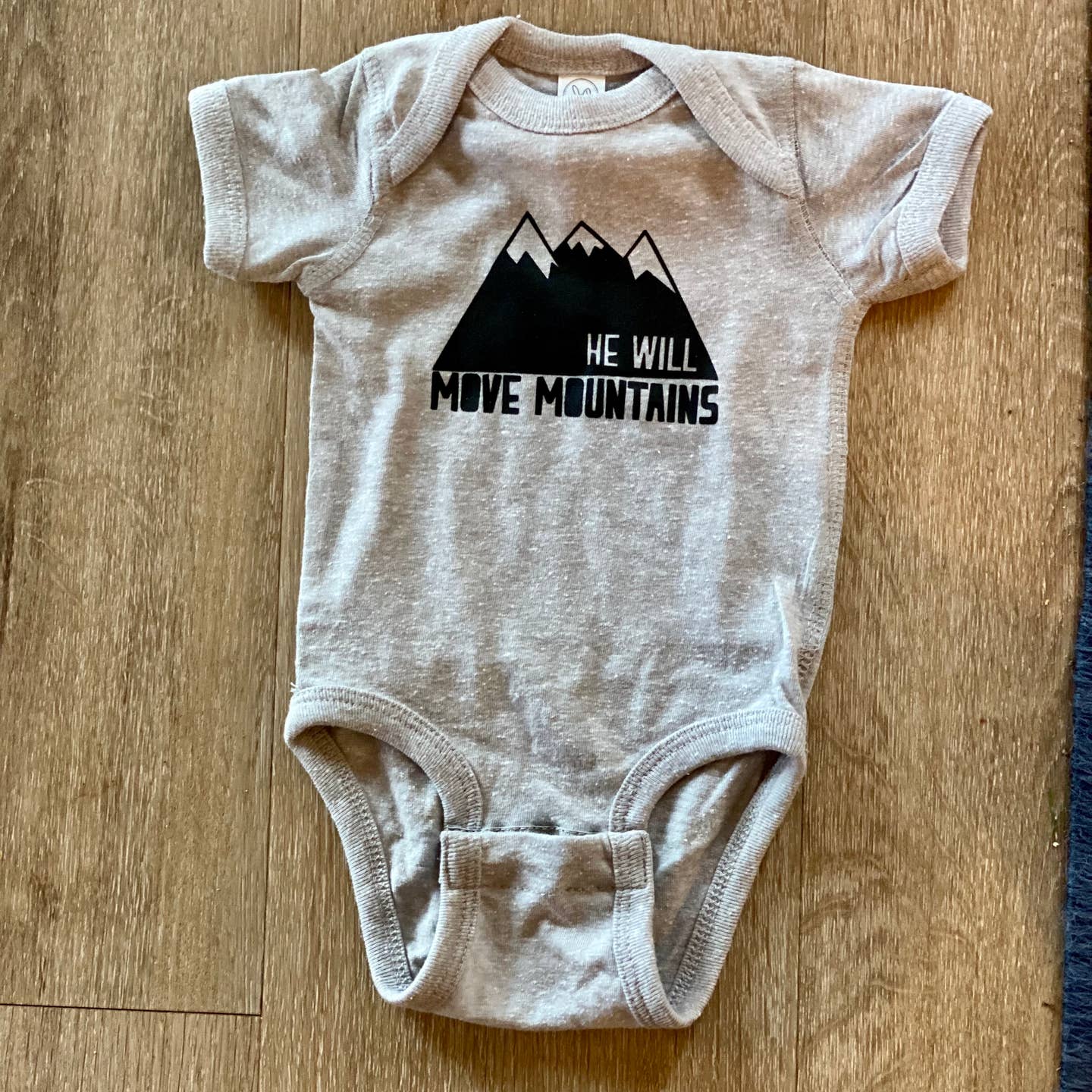 He Will Move Mountains Onesie